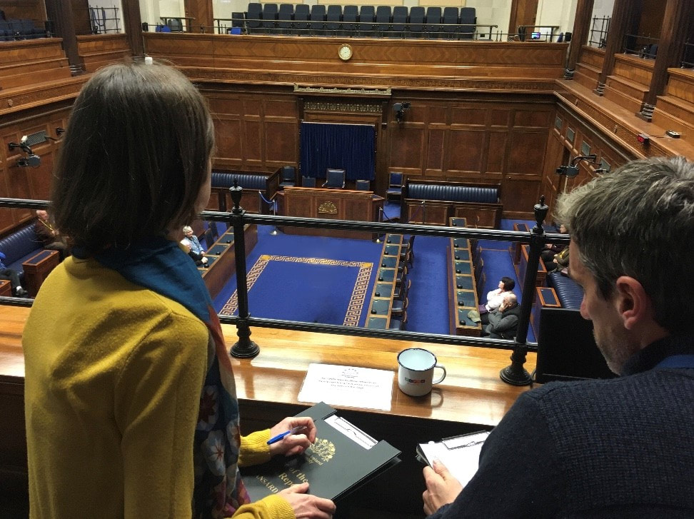 Reporters in the Northern Ireland Assembly chamber